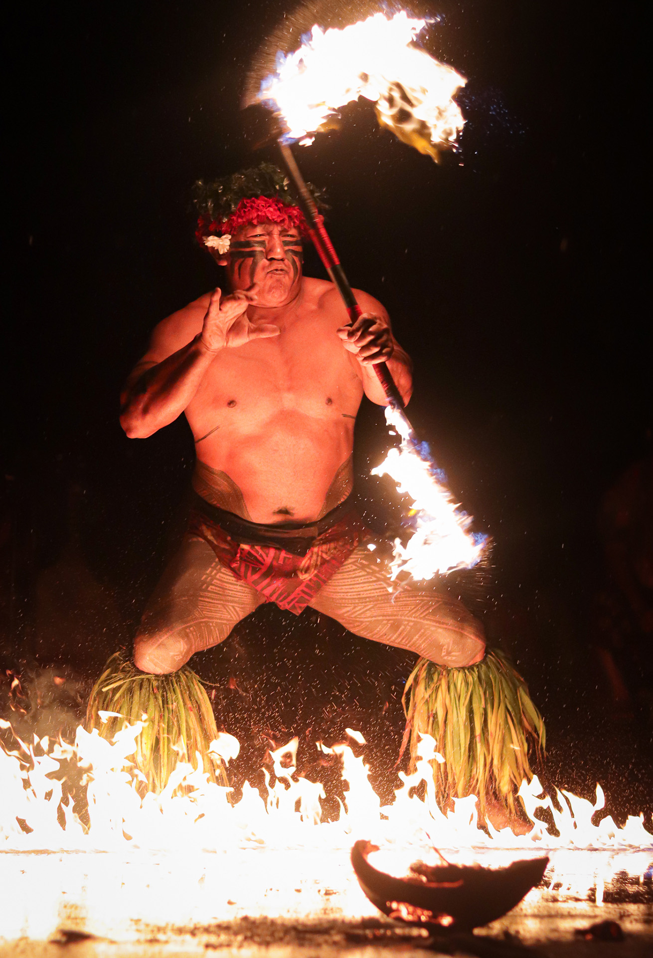 The Chief doing a traditional fire-knife dance